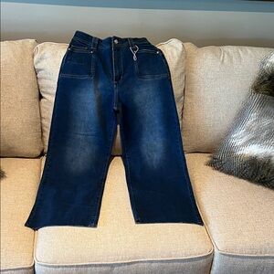 Women's trendy high waisted cropped capri jeans. Raw hem. Precious on.